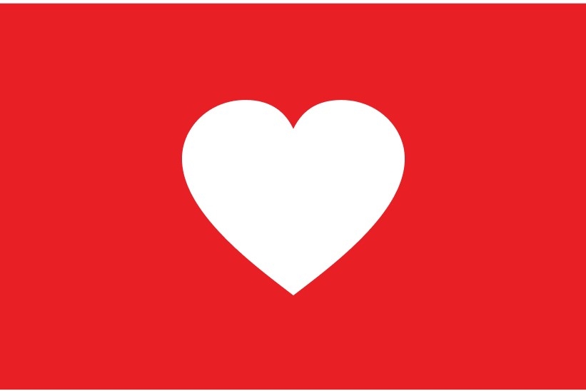 Purina Cares for communities logo with white heart on a red background